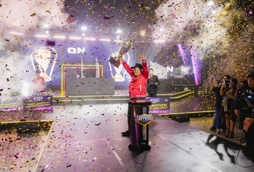 Tatay Benigno holding his Trophy
